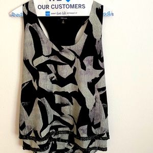 Black and white racer back top. Size S